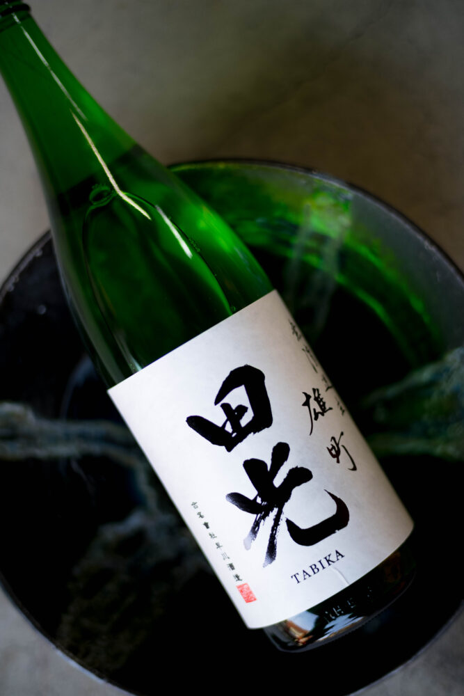 田光　早春　TABIKA　SOUSHIYUNトミヤオリジナル　 富屋オリジナル　早川酒造
タビカ　たびか　ソウシュン　そうしゅん　ハヤカワシュゾウ　はやかわしゅうぞう
三重県三重郡菰野町小島468 袋搾り　手造り　拘り　特約流通　純米大吟醸　山田錦　
雄町　神の穂　出羽燦々　名古屋唯一　正規特約店　早川俊人　杜氏　全量袋搾り　
専務取締役　鈴鹿山脈 今朝搾り　2022　名古屋田光ジャック　期待の蔵元　雄町サミット2022優等賞受賞　エトボトル　干支ボトル　プリント瓶　720ｍｌ展開作品
名古屋から全国へ 株式会社富屋酒店　トミヤサケテン　とみやさけてん 
TOMIYA　SAKETEN　NAGOYA　愛知県名古屋市瑞穂区上坂町1-41-2 tomiya-saketen.com　特約店　特約流通　地酒　ワイン　専門店　 社長　代表　上田豊二
マニア　おたく　ライカM11　ズミルックス50　レンズ　堀田駅　熱田神宮駅
名古屋高速　堀田出口すぐ　牛巻交差点すぐ　レトロ街並み　瓦屋根　きき酒師
焼酎アドバイザー　シャンパーニュシュヴァリエ【Tomiya   SpecialSpecialSpecial  Model】田光　特別純米酒　＜雄町＞　今朝搾り　無濾過生酒　2023」ご予約開始いたします。全国唯一。富屋酒店×早川酒造が生み出す、超絶本気ライブな作品。　画像はイメージ。早川さんが心から惚れ込む、田光が生まれたキッカケとなった「雄町米」を全量使用し、60％精米。丁寧な醸し。夜中から渾身の袋搾り。搾りあがった液体を瓶詰めし、早朝私自身がお蔵に伺い名古屋へ輸送。当日、ご予約いただきました飲食店様に営業前までに当店スタッフより全量お届け。その日に搾ったお酒を。その日の夜皆様のもとへ。「名古屋・田光ジャック　2023」。今年も開催です。最高のライブ感を皆様のもとへ。最高の夜を分かちあいましょう。発売は4月下旬予定。上槽日決まり次第告知いたします。ご予約は、ご来店、お電話、メールにて承ります。皆様からの素敵な素敵なご予約お待ちしております。
柔らTABIKA SPECIAL JUNMAI HATTANNISHIKI NAMASAKE 【TOMIYA SPECIAL SPECIAL SPECIAL MODEⅬ】 2023　チャーミングな旨味がくせになる。「田光　TABIKA　＜夏のブーリュ　BOURRU＞　2023」TABIKA  SPECIAL JUNMAI  HATTANNISHIKI NAMASAKE  【TOMIYA SPECIAL SPECIAL SPECIAL MODEⅬ】 2023　真夏の暑さを癒す瑞々しい清涼感溢れるCUTEな作品。「田光　TABIKA　＜Malic  acid＞　2023」りんご酸のキュートな味わいが酷暑の日々を癒す。「田光　＜Malic  Acid   マリック・アシッド＞　2023」
優しく。豊かに。秋の夜長の癒しの純米。「田光　TABIKA　槽搾り　＜豊穣　HÔJÔ＞　2023」氷温生熟成による枯れ感が温度変化の魅力を魅せてくれる。【TOMIYA SPECIAL】「田光　TABIKA　純米吟醸　＜出羽燦々　DEWASANSAN＞　無濾過氷温生熟成」（株）富屋酒店 かぶしきがいしゃ とみやさけてん カブシキガイシャ　トミヤサケテン TOMIYA SAKETEN 　愛知県名古屋市瑞穂区上坂町1-41-2　地酒屋　豊盃　HOUHAI ほうはい　ホーハイ　三浦酒造  MIURASHUZO日高見　ひたかみ　ヒタカミ HITAKAMI  平孝酒造　HIRAKOSHUZO 天の戸 アマノト　あまのと　AMANOTO　浅舞酒造 ASAMAISHUZO　飛露喜 HIROKISHUZOHONTEN　廣木酒造本店　HIROK　大那 DAINA　ダイナ　だいな　菊の里酒造　KIKUNOSATOSHUZO　旭興　KYOKUKO　きょくこう　キョクコウ　渡邉酒造　WATANABESHUZO　仙禽 SENKIN　せんきん　センキン（株）せんきん SENKIN鶴齢　カクレイ　かくれい KAKUREI　青木酒造　AOKISHUZO謙信 ケンシン　けんしん KENSHIN池田屋酒造 IKEDAYASHUZO 白岳仙 HAKUGAKUSEN　ハクガクセン　はくがくせん　安本酒造 YASUMOTOSHUZO 群馬泉 グンマイズミ　ぐんまいずみ 島岡酒造 SHIMAOKASHUZO  喜久醉 きくよい キクヨイKIKUYOI 青島酒造 AOSHIMASHUZO 長珍 ちょうちん　チョウチン長珍酒造CHOCHINSHUZO　みねたからみりん　峯寳 味醂　一子相伝 ミネタカラ　いっしそうでん　イッシソウデン　小笠原味醂 OGASAWARA MIRIN

瀧自慢　たきじまん　タキジマン　瀧自慢酒造　TAKIZIMANSHUZO　田光　TABIKA 早川酒造  HAYAKAWASHUZO　作　ZAKU ざく ザク 清水清三郎商店 SHIMIZUSEIZABUROSHOTEN  篠峯　櫛羅　しのみね　シノミネ　くじら　クジラ　千代酒造　CHIYOSHUZO　雑賀　さいか　サイカ　九重雑賀  KOKONOESAIKA　紀土　鶴梅　無量山　きっど　キッド　KID 　ツルウメ　つるうめ　TURUUME　ムリョウザン　むりょうざん　MURYOZAN　平和酒造　HEIWASHUZO　蒼空　そうくう　ソウクウ　SÔKÛ　藤岡酒造　HUJIOKASHUZO 　宝剣　HOUKEN  宝剣酒造　ほうけんしゅぞう　ホウケンシュゾウ　HOKENSHUZO　清酒竹鶴　小笹屋竹鶴　せいしゅたけつる　セイシュタケツル　おささやたけつる　オササヤタケツル　竹鶴酒造　TAKETURUSHUZO
石鎚　いしづち　イシヅチ　石鎚酒造　ISHIDUCHISHUZO　土佐しらぎく　とさしらぎく　トサシラギク　仙頭酒造場　せんとうしゅぞうじょう　SENDOSHUZOZYO　アルガブランカ　ARUGABURANKA勝沼醸造　KATUNUMAJÔZÔ　ドメーヌソガ　ソガ・ペール・エ・フィス SOGA PELE ET FIS　オブセワイナリー　OBUSEWINERY　ドメーヌタカヒコ　DOMAINE TAKAHIKO　クリサワブラン　KURISAWA BLANC　ナカザワワイナリー　NAKAZAWA WINERY　さつま寿　SATUMA KOTOBUKI 　尾込商店 OGOME SHOTEN  蔵の師魂 KURANOSHIKON  小正醸造　KOMASA ＪÔＺÔ　天狗櫻 TENGUSAKURA  白石酒蔵　SHIRAISHISHUZO  しま千両 SHIMASENRYO　高崎酒蔵  TAKASAKISHUZO  杜氏潤平　TOJIJUNPEI  小玉醸造  KODAMAJOZO  赤鹿毛　青鹿毛  AKAKAGE   AOKAGE　柳田酒蔵  YANAGIDASHUZO　舞香　MAIKA　泰明　TAIMEI　藤居醸造　HUZIIJÔＺÔ　池の露　特酎天草　IKENOTUYU  TOKUCHU  AMAKUSA　壱乃醸　飛乃流　朝日　ICHINOJO  HINORYU　ASAHI　朝日酒造　ASAHISHUZO　龍宮　RYUGU 富田酒造場　TOMITASHUZOJO　鳥飼 TORIKAI　鳥飼酒造　TORIKAISHUZO　極楽 GOIKURAKU　林酒造場 HAYASHISHUZOJO　屋久の島大自然林　酔麦香　YAKUNOSHIMA DAISHIZENRIN SUIBASKUKA　本坊酒造　HONBOSHUZO
金峰　金峰荒蘆過  KINPO　KINPOARAROKA　宇都酒造　UTOSHUZO　北谷長老　CHYATANCHÔＲÔ　北谷酒造　CHYATANSHUZO　山原くいな　YAMBARUKUINA　やんばる酒造　YAMBARUSHUZO　2024年春オープン予定 いいねタウン瑞穂 iiNE マルシェ内　グランクレア瑞穂 いいねタウン瑞穂  愛知県名古屋市瑞穂区宝田町四丁目2番、3番2　春敲町三丁目23番1（地番） 魚太郎　UOTARO MIZUHO うおたろう　ウオタロウ　なごやみずほてん　ナゴヤミズホテン　 名古屋瑞穂店  車で1分　徒歩5分　丸明 瑞穂店  MARUAKI MIZUHO　マルアキ ミズホテン　まるあき みずほてん　 徒歩10分　車3分　焼肉 美奈登  ヤキニクミナト　やきにくみなと YAKINIKU MINATO 車で2分　徒歩10分  どての品川　DOTENO SHINAGAWA　ドテノシナガワ　どてのしながわ　車で30秒　徒歩1分昇福亭　SHOHUKUTEI しょうふくてい　ショウフクテイ 街中華　マニア　大盛り　個性派  車で5分　徒歩15分  名店 近くにたくさんあり　堀田バンザイ　牛巻バンザイ　名古屋のへそ
神の穂の優しさと美しさを見事に表現 今期の田光も目が離せない 「田光  TABIKA  純米吟醸  ＜初しぼり FIRST SQUEEZE＞ 神の穂  R5BY」美しき雄町の味わいを スムースにシルキーに味わう逸品  「田光  TABIKA  純米吟醸  ＜雄町  OMACHI＞  無濾過生酒  R7BY